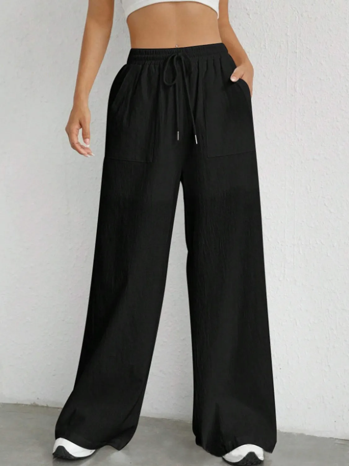 Stylish wide leg pants with drawstring at Beezti