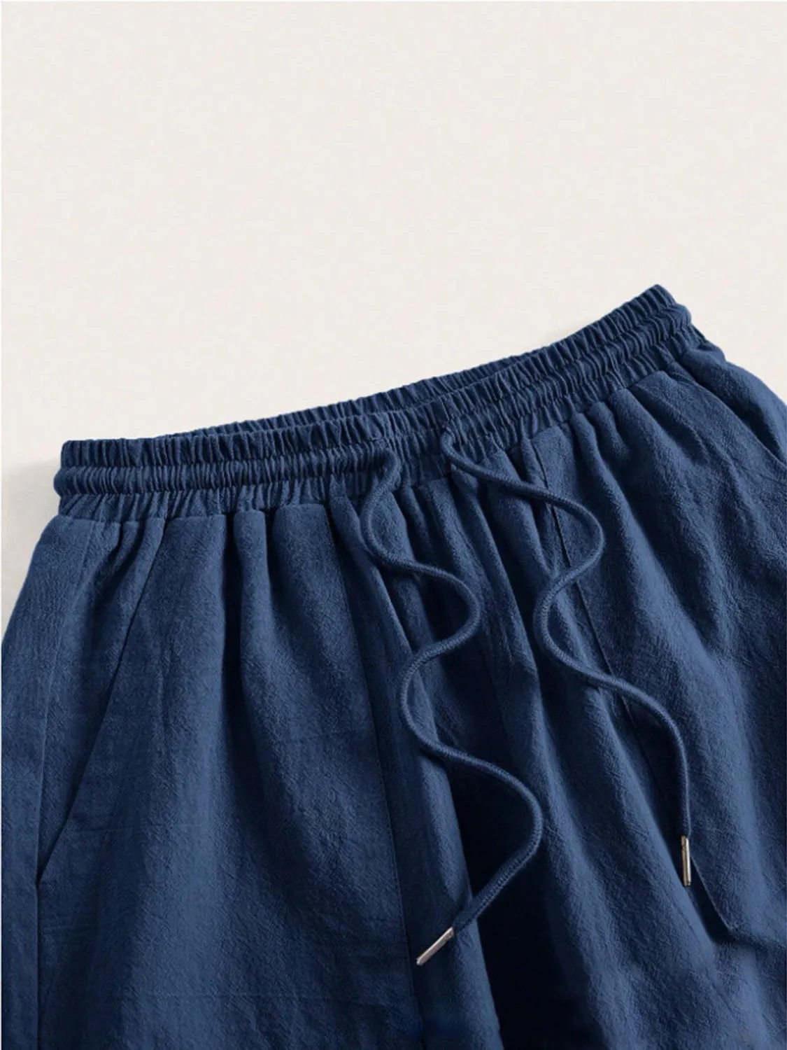 Stylish wide leg pants with drawstring at Beezti
