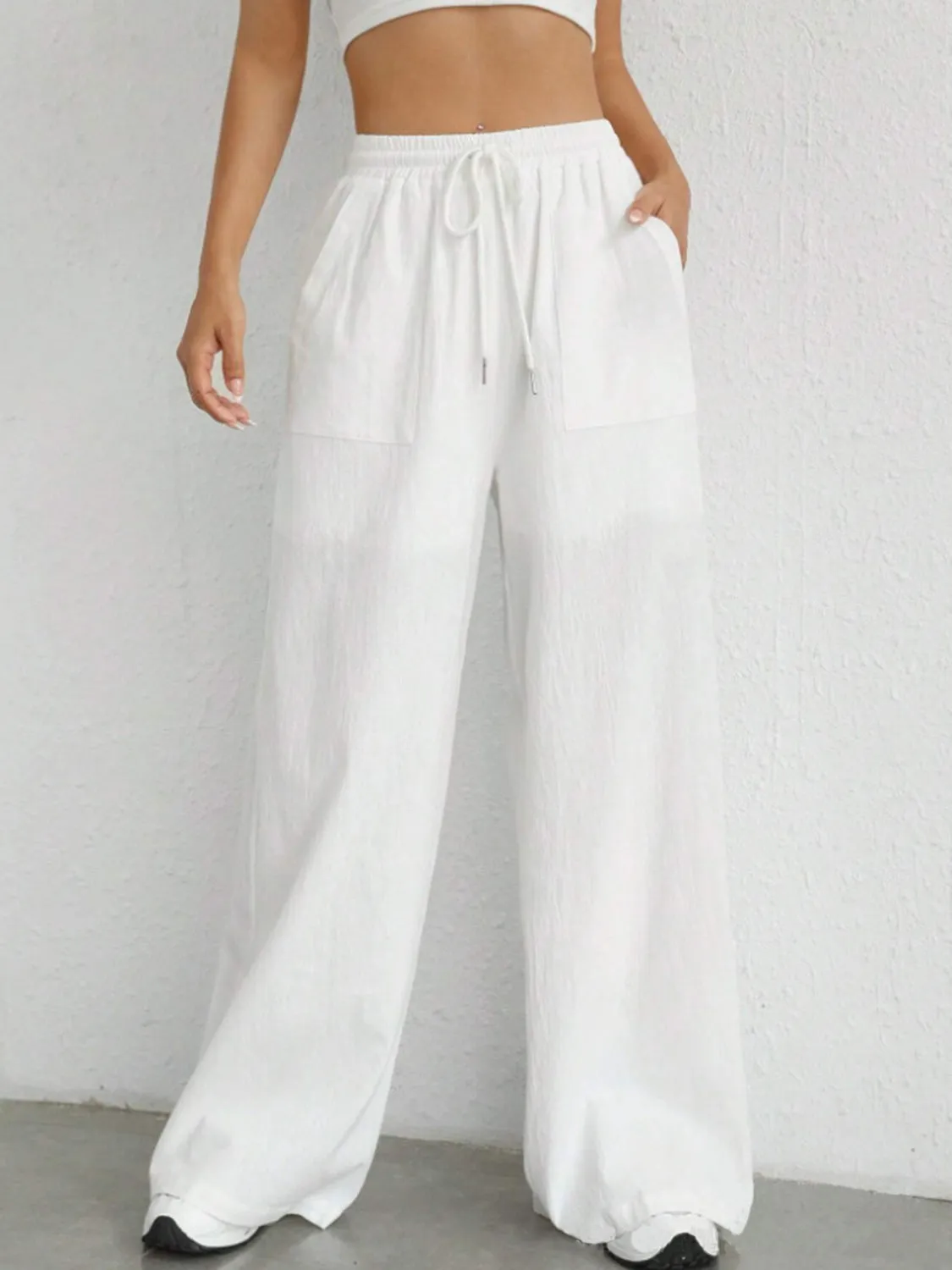 Stylish wide leg pants with drawstring at Beezti