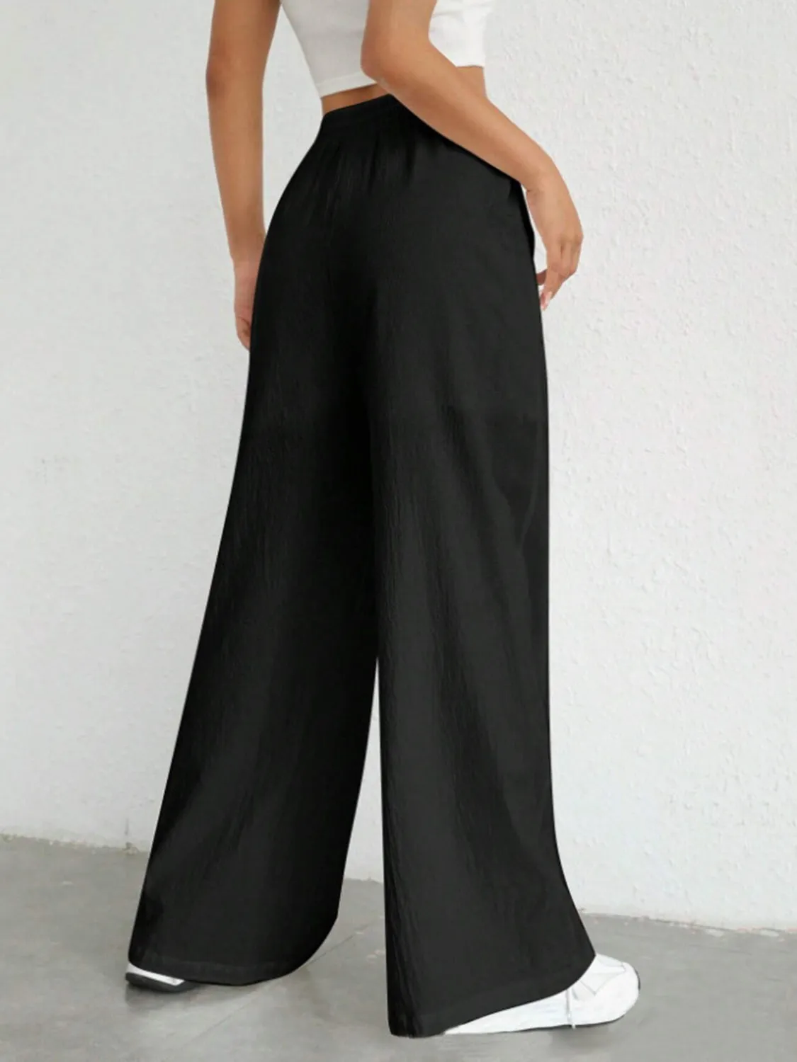 Stylish wide leg pants with drawstring at Beezti