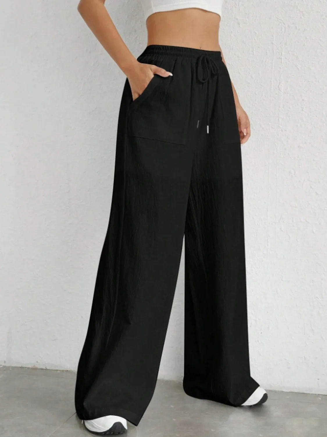 Stylish wide leg pants with drawstring at Beezti